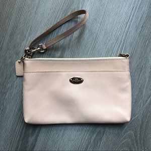 Coach light pink wristlet bag